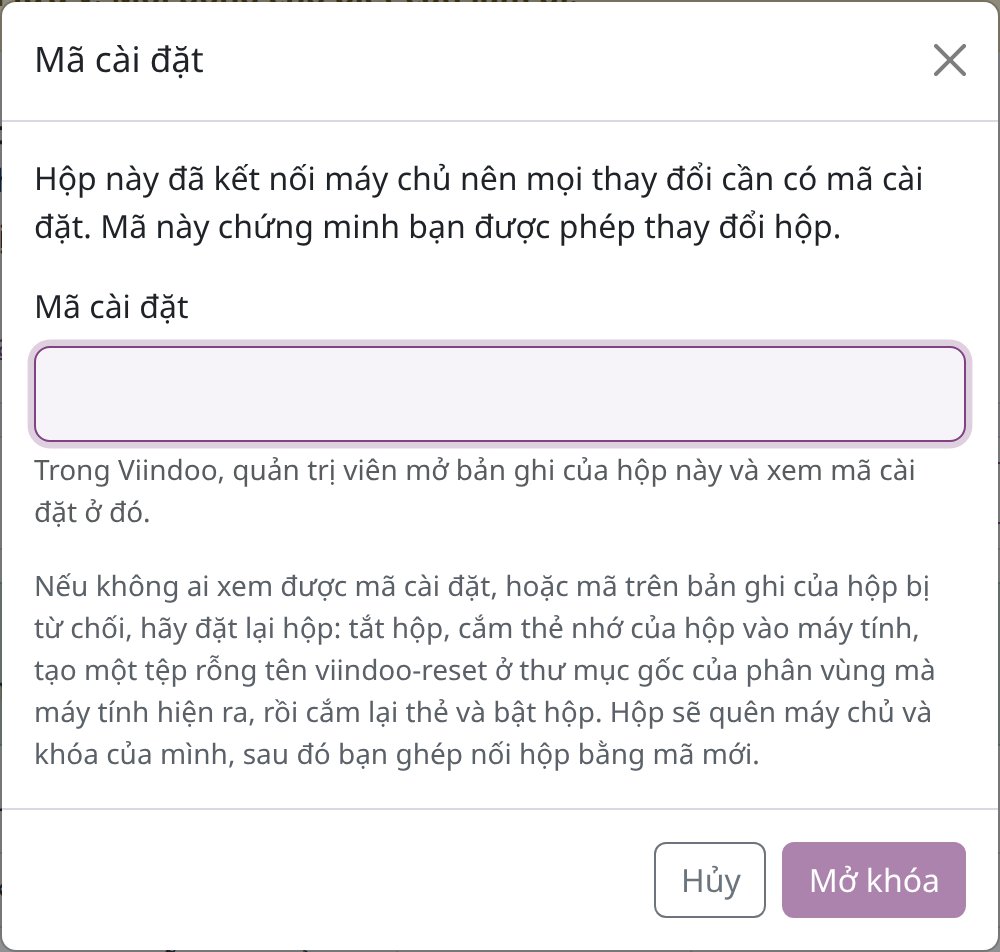 Hộp thoại Mã cài đặt của trang hộp với nút Mở khóa